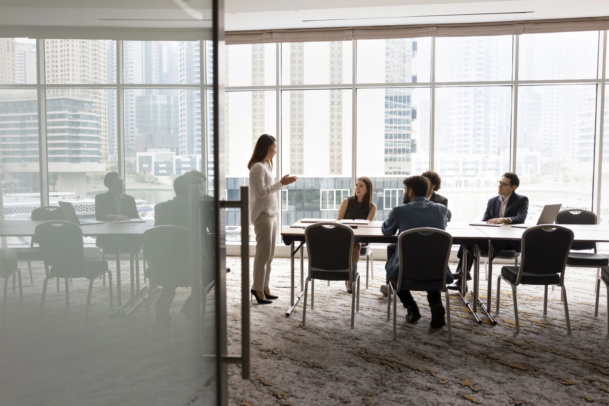 Business team collaborating around a meeting table