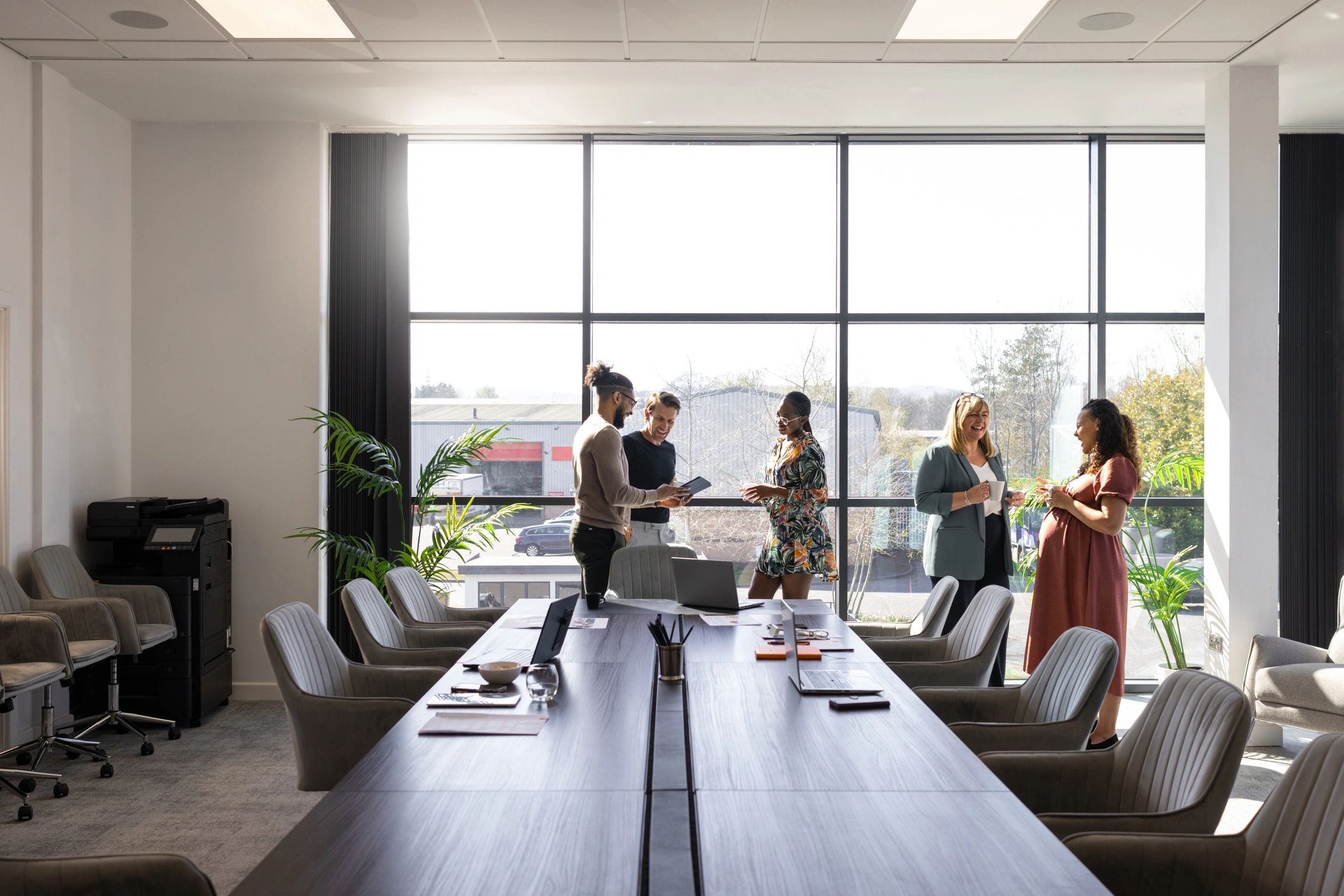 Troventia team collaborating in a modern conference room