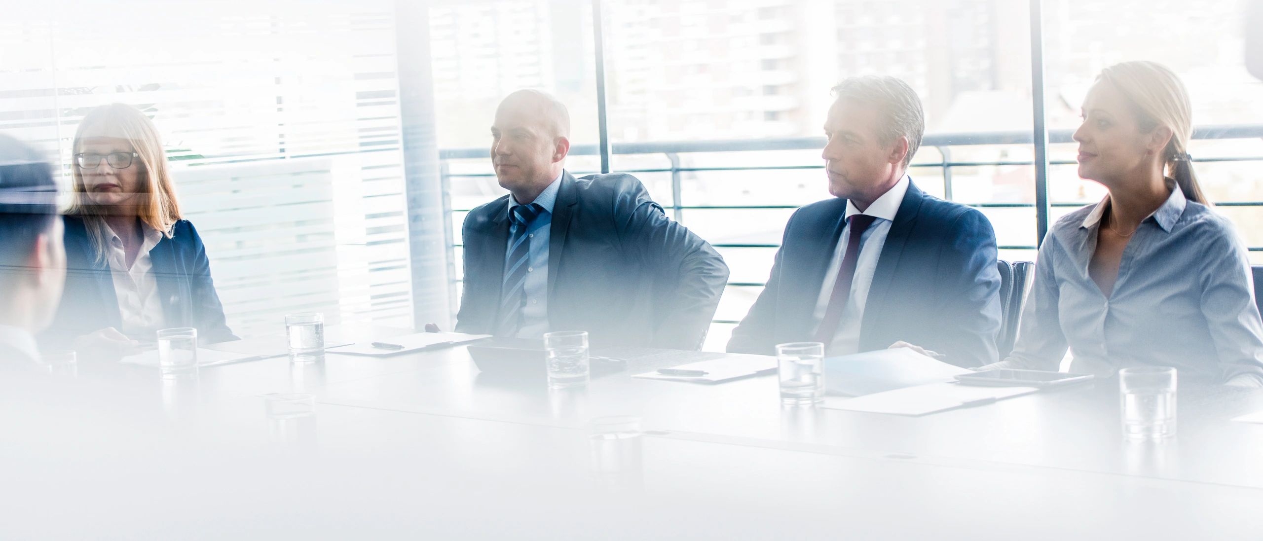 Consulting team in a modern boardroom meeting